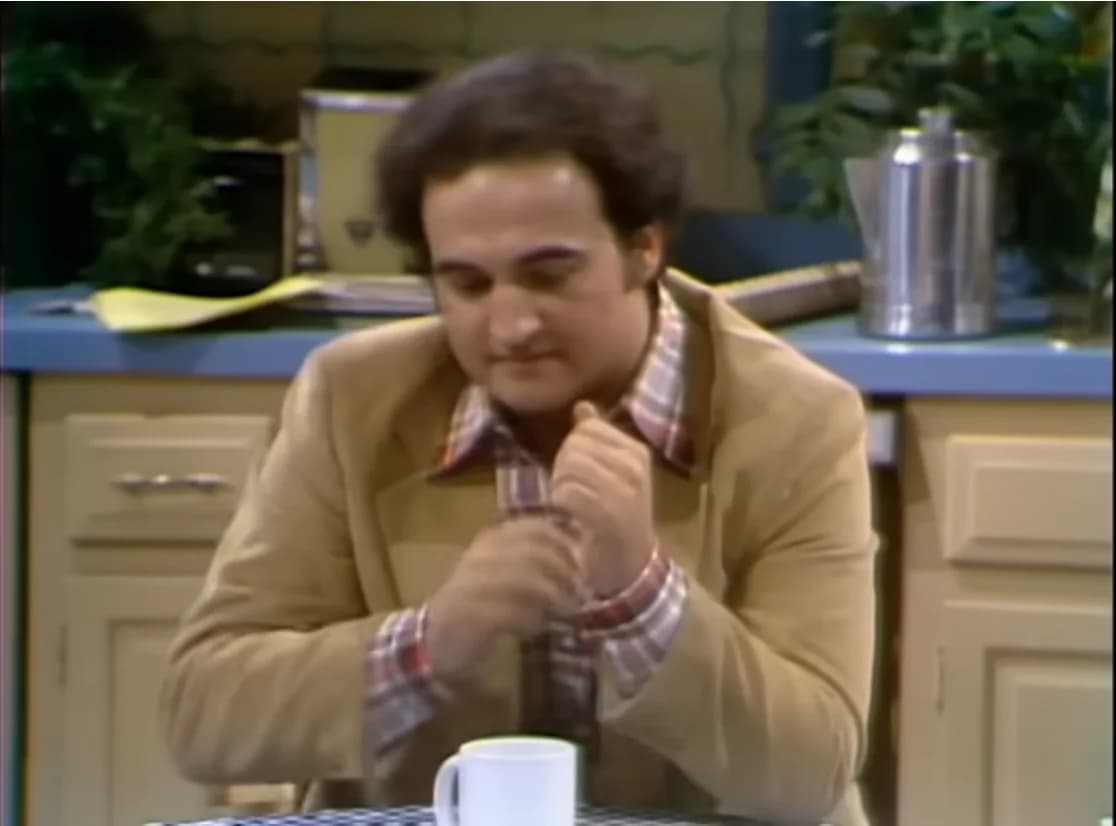 loi.JOHN BELUSHI REFUSES TO PLAY ALONG!